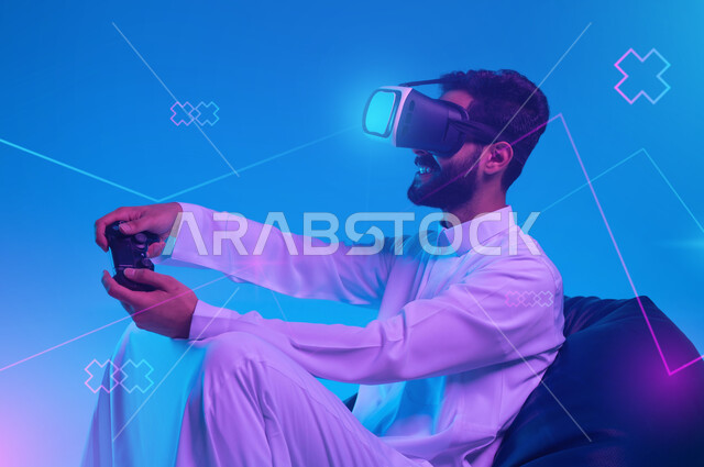 Integrating entertainment with virtual and imaginary reality, using technological devices and modern technologies, a portrait of a Saudi Gulf Arab young man wearing a traditional dress and VR glasses sitting on a bean bag chair and holding a controller playing entertainment video games, a background of 3D navigation button icons