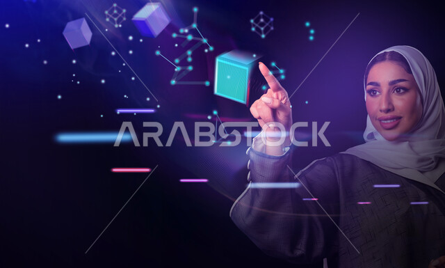 استخدام التقنيات الحديثة، التعامل مع العالم الافتراضي، إمرأة عربية خليجية سعودية مبتسمة ترتدي الحجاب تقوم بالنقر على الشاشة الهولوجرامية، خلفية مكعبات ونقاط ملونة ثلاثية الابعاد