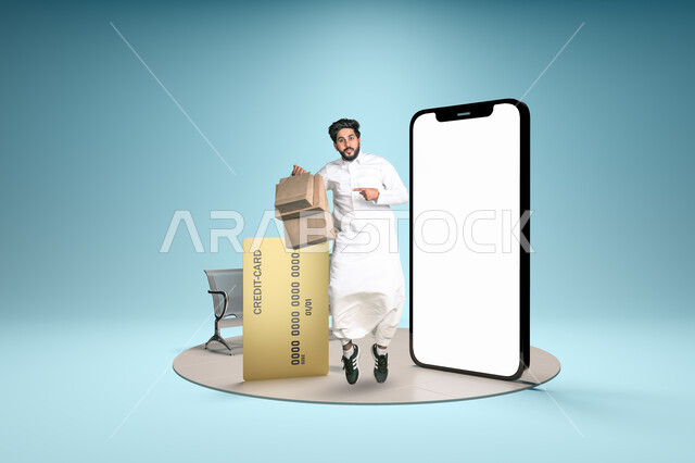 إستلام الطرود وخدمات الشحن والتوصيل، بورتريه لرجل عربي خليجي سعودي يرتدي الثوب التقليدي يحمل بيديه أكياس التسوق يقفزعلى قاعدة دائرية امام بطاقة الدفع الالكتروني وشاشة الهاتف المحمول، موك أب لمستطيل أبيض، الشراء والتسوق اونلاين, تعابير الحماس والسرور, خلفيه زرقاء