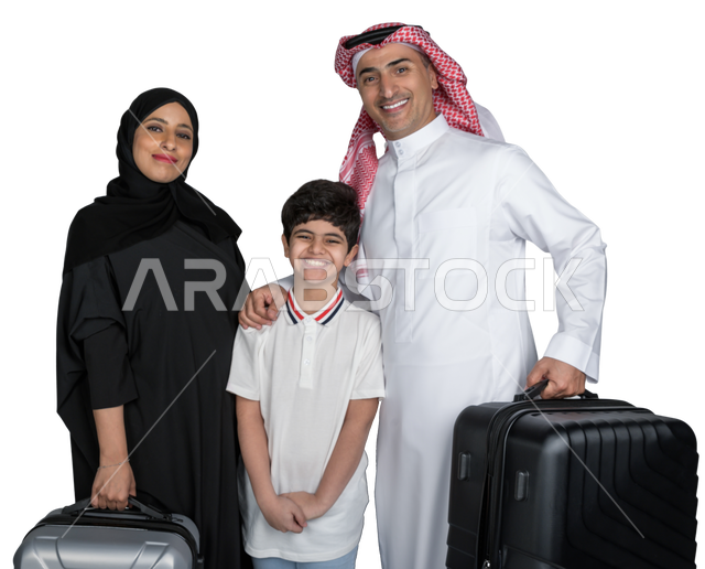 Portrait of a happy Saudi Arabian Gulf family with suitcases, ready to