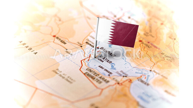The flag of the State of Qatar fixed on the map, the banner of the symbol of the Qatari state, the Qatari capital Doha, Qatari National Day, love of the homeland and belonging to it