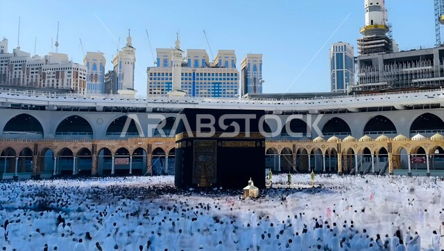 Pilgrims and Umrah pilgrims circumambulate around the Holy Kaaba in Mecca, the Holy House of God in the Holy Mosque in Mecca in the Kingdom of Saudi Arabia, sacred Islamic places and landmarks, performing Hajj and Umrah rituals, worship and getting closer to God, the Qibla of Islam and Muslims.