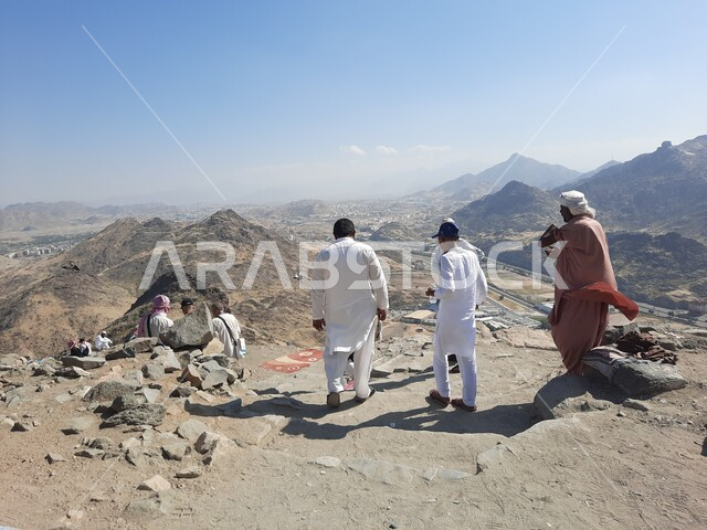 Holy Islamic places, a distinct view of the Mountain of Light in Mecca, a picture from the back of the influx of visitors from all over the world to visit Hira Cave, the mountain peaks and heights, famous religious landmarks in the Kingdom of Saudi Arabi