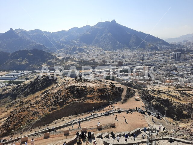 Mountain peaks and heights, rock formations and formations on Jabal Al-Nour in Mecca, distinct terrain, mountains and landscapes, Islamic holy places, houses and residential buildings, famous religious landmarks in the Kingdom of Saudi Arabi