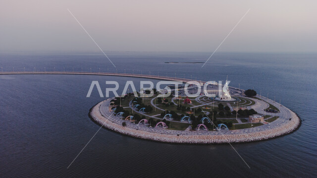 The waterfront and Dammam Corniche at sunset, an aerial photo of the artificial Al-Marjan Island in the Arabian Gulf, family entertainment places and attractions, a tourist destination to attract tourists to the Kingdom of Saudi Arabia, architectural works of art amidst the marine nature