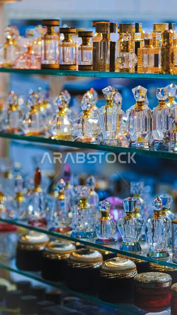 A close-up of Arabic perfume bottles in Souq Waqif in Doha, shops selling perfume and Arabic perfume, shopping and shopping in the popular tourist markets in Qatar, famous landmarks and places, traditional traditional oils.