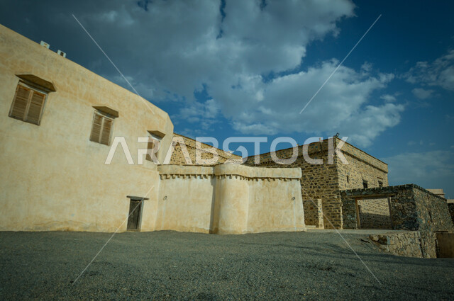 Ancient historical places during the day, ancient heritage facilities in the Kingdom of Saudi Arabia, ancient popular neighborhoods, old-style architecture for building stone houses