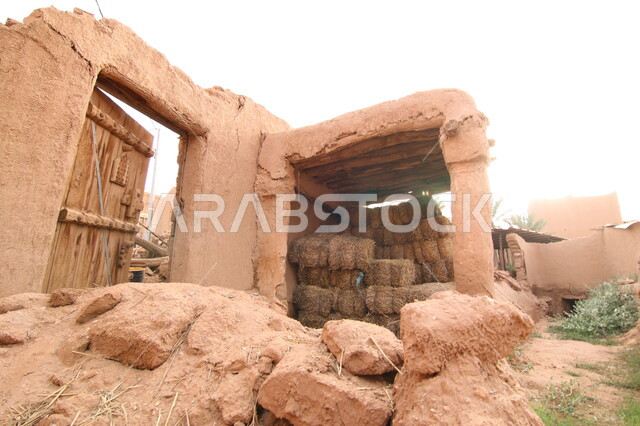 The remains of demolished ancient mud buildings, ancient historical villages and houses in the Shaqra Governorate in the city of Riyadh, an abandoned mud house in the heritage village of Ushaiqar in the Kingdom of Saudi Arabia, famous landmarks and tourist places.