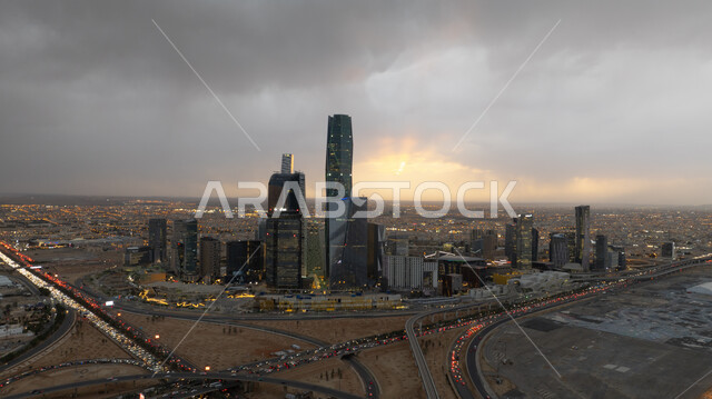 Architectural facilities in the Kingdom of Saudi Arabia, a distinctive view of the King Abdullah Financial Center (CAFD) at sunset, interest in tourism areas to attract visitors from all over the world, the development of architectural engineering for buildings and skyscrapers in Riyadh, building a civilized and advanced future