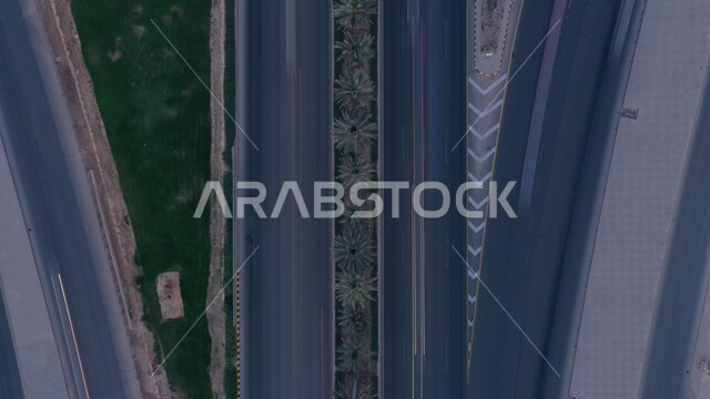 صورة جوية مقربة لطرق وشوارع الرياض في النهار، تقدم و تطور الفن الهندسي العمراني في المملكة العربية السعودية، الاهتمام بزراعة الأشجار و النباتات في المدن