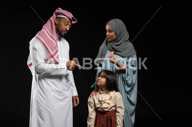 The concept of upbringing and modifying children’s wrong behaviour, a portrait of a Saudi Gulf Arab family, a father reprimanding and warning his daughter against repeating mistakes, the wife asking the husband to be patient, wait and calm, inappropriate behavior by the quarrelsome girl, black background