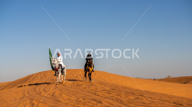 الاستمتاع بممارسة الأنشطة الترفيهية في المناطق الصحراوية, فارس وفارسة عربيان خليجيان سعوديان يمتطيان الجياد العربية الأصيلة, يوم بدينا 1727م, ذكرى تأسيس الدولة السعودية الأولى في 22 فبرير, اليوم الوطني 23 سبتمبر, استذكار يوم العلم 11 مارس, رفع علم المملكة بفخر
