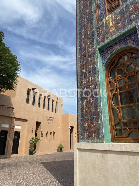 Katara Village Mosque in the city of Doha, architectural art in the modern Islamic style, the cultural district in Qatar, performing religious duties and prayers, worship and getting closer to God, famous religious landmarks