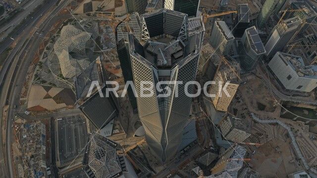 Distinctive architectural arts and designs for economic towers and skyscrapers, leading high-end companies in banking services and financial technology, an aerial photo from above of the King Abdullah Financial Center (KAFD) in Riyadh, Saudi Arabia, the ideal destination for finance and business with international standards.