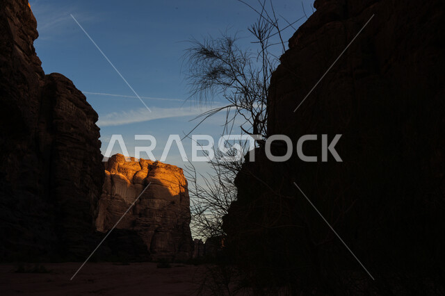 Desert areas and sand dunes in the prairies, ancient historical monuments in Tabuk, famous tourist places in the Kingdom of Saudi Arabia, desert natural reserves, a silhouette of the mountain range and rock formations and formations in the Al-Zaytah area, Salwit.