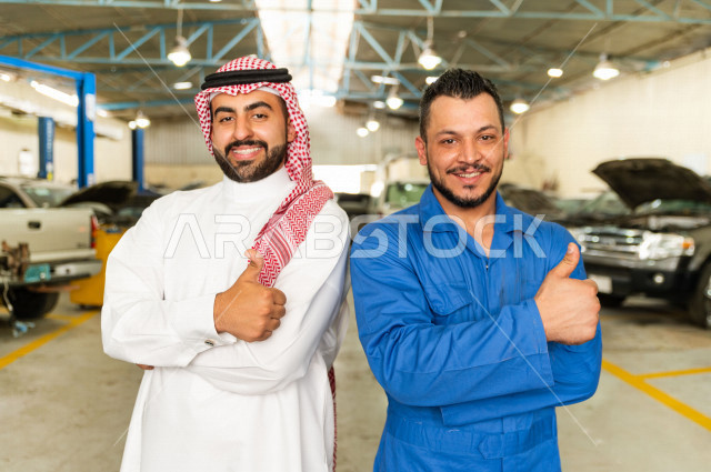 A Saudi Arab man stands with the mechanical engineer inside the auto workshop, with different face and hand gestures, car repair and maintenance services, a mechanical engineer, a maintenance workshop