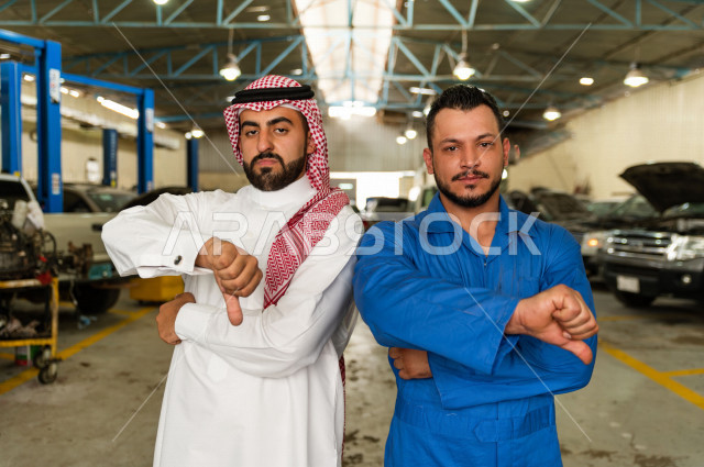 A Saudi Arab man stands with the mechanical engineer inside the auto workshop, with different face and hand gestures, car repair and maintenance services, a mechanical engineer, a maintenance workshop
