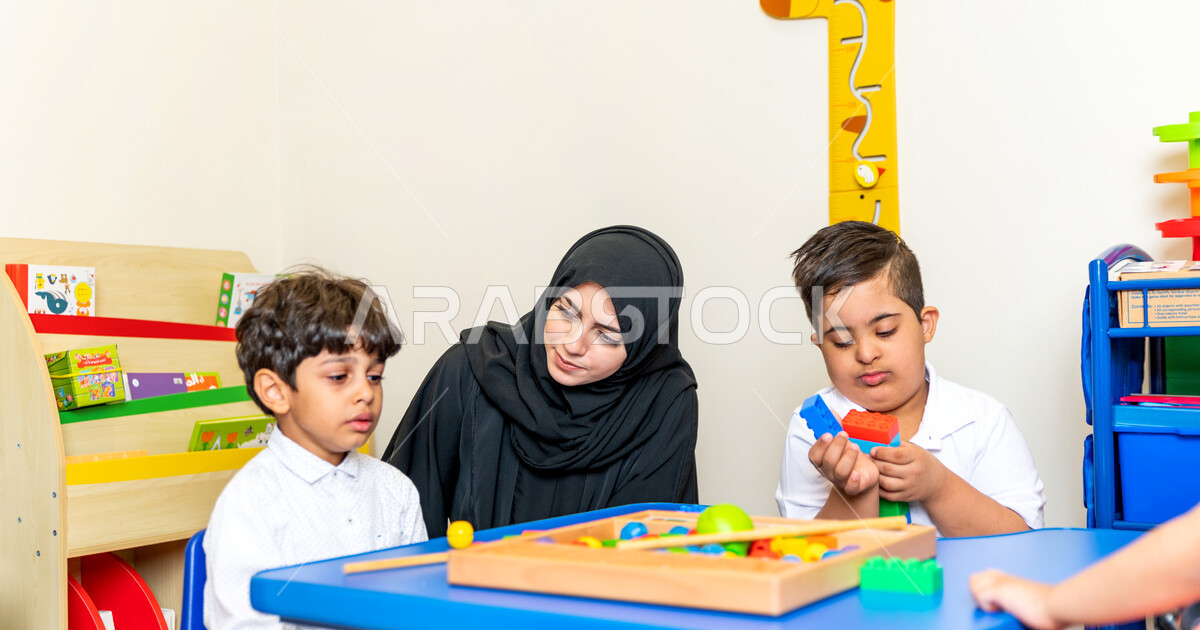A Saudi Arabian kindergarten teacher specializing in caring for ...