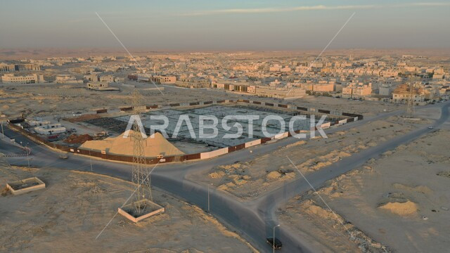 دوضع حجر الأساس في عمار الأبنية، مهن ووظائف هندسية، صورة جوية لموقع بناء ومقاولات في المملكة العربية السعودية، مبنى تحت الانشاء، التطور الهندسي المعماري