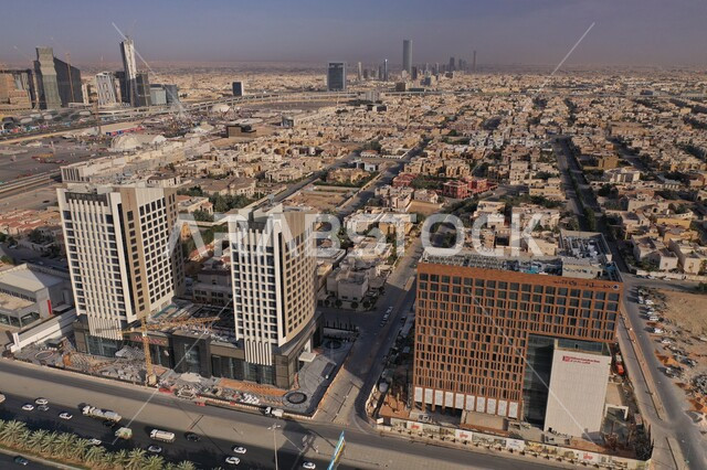 Population congestion in the capital, the skyline of Riyadh during the day, the transportation network and traffic on the roads and streets of the Kingdom, modern architectural engineering, urban development and growth of residential and commercial facilities and buildings in Saudi Arabia.