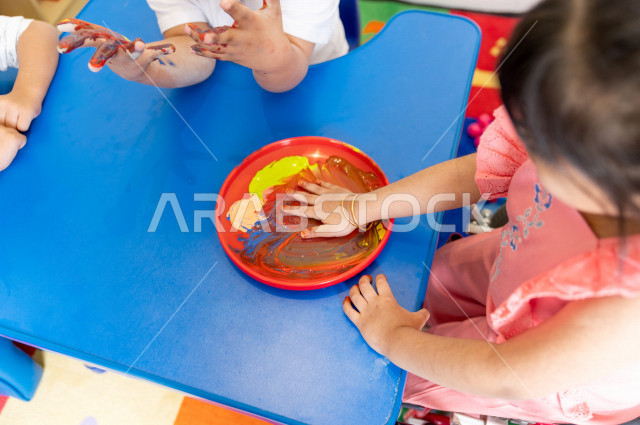 A Saudi girl crippled in a kindergarten, she performs many fun and different activities, a girl with special needs, a group of individual activities that the child of determination does, integrating people with special needs in kindergartens and incubator