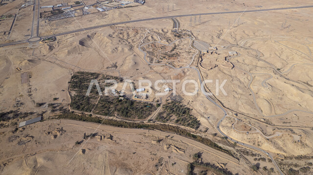 وجهة مثالية لقضاء أوقات ممتعة، فعاليات وأنشطة ترفيهية في الحدائق والمتنزهات العائلية، صورة جوية علوية لمنتزه الملك سلمان البري في مدينة الرياض، معالم سياحية مشهورة في السعودية، الاهتمام بالهندسة الزراعية والنباتات الخضراء.