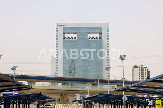 Riyadh Metro train line in front of the King Abdullah Financial Center (CAFD), transportation network and traffic in the capital, modern means of transportation, famous tourist places and landmarks in the Kingdom of Saudi Arabia