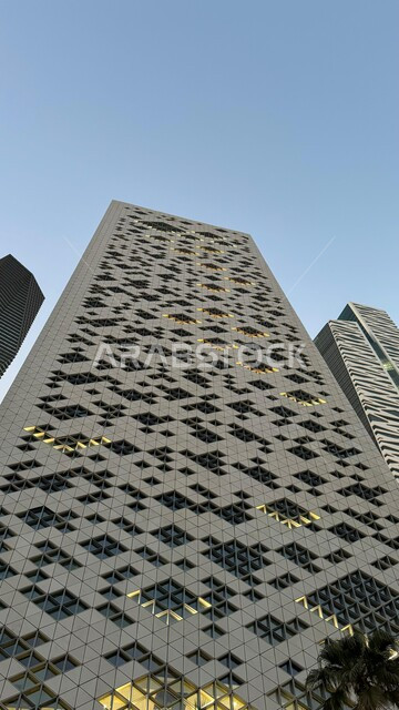 Architectural engineering art of skyscrapers, a close-up of the King Abdullah Financial Center (KAFD) at daytime, urban growth and development in the Kingdom of Saudi Arabia, famous landmarks and places, financial towers and economic facilities in the city of Riyadh
