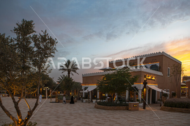 Mud constructions built in the old style at sunset, authentic Saudi Arabian civilization, enjoying the famous tourist attractions, archaeological entertainment places during the day, the historic Diriyah development project, Al-Bujairi Overlook and Park in the Diriyah neighborhood in the city of Riyadh