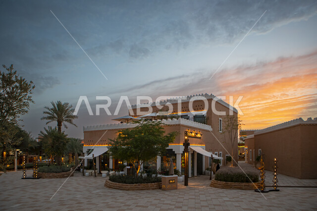 Mud constructions built in the old style at sunset, authentic Saudi Arabian civilization, enjoying the famous tourist attractions, archaeological entertainment places during the day, the historic Diriyah development project, Al-Bujairi Overlook and Park in the Diriyah neighborhood in the city of Riyadh