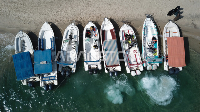 Waterfronts in the Eastern Province, famous tourist attractions in the Kingdom of Saudi Arabia, recreational coastal areas, enjoying sea trips and excursions, an aerial photo of boats on Half Moon Beach in Dammam