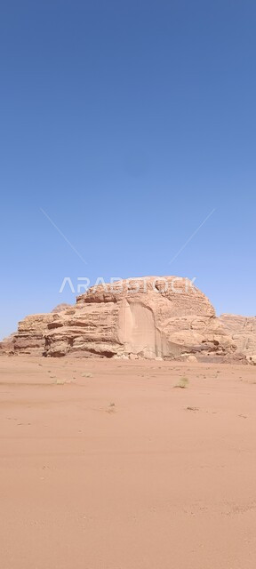 Desert environment, mountain peaks and heights, natural tourist places in the Kingdom of Saudi Arabia, rock formations and formations in the Hasma Desert, Wadi Rum in the city of Tabuk during the day, nature background