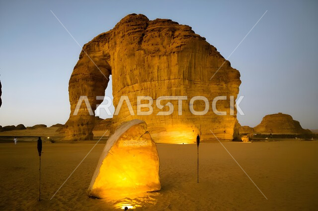 Famous tourist places and ancient historical monuments, Elephant Rock in the Kingdom of Saudi Arabia, natural rock formations in Al-Ula Governorate, decorations and external lighting to attract tourists.