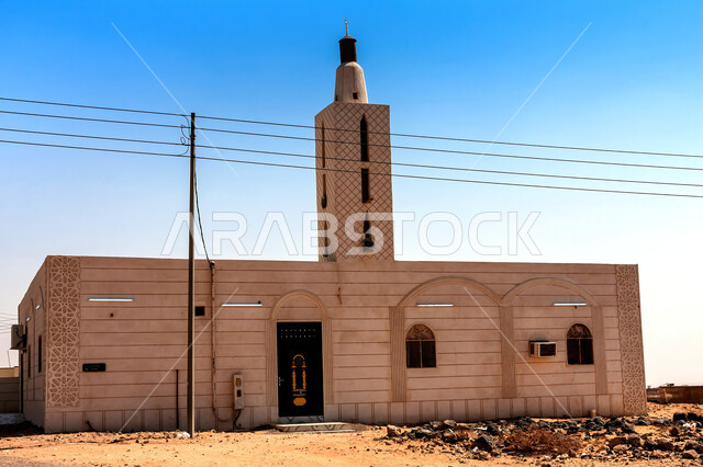 Architectural engineering art in the Islamic style, a small mosque in the village of Harra Kashab in Al-Muwayh Governorate in Mecca, an Islamic religious institution in the Kingdom of Arabia, inviting Muslims to worship and become closer to God.