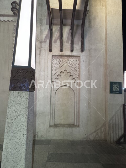 Traditional mud shops and buildings, the ancient archaeological popular Qaysiriyah market in Al-Ahsa Governorate at night, the art of architectural design for heritage markets, famous tourist attractions in the Kingdom of Saudi Arabia