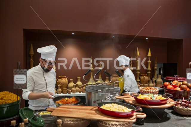 A buffet serving delicious items and foods, Ramadan season activities in the city of Riyadh, spending enjoyable time with the family in upscale cafes and restaurants in the Kingdom of Saudi Arabia, the atmosphere of celebrating the advent of the holy month of Ramadan