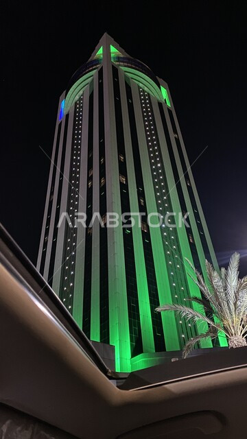 Commemoration of Science Day, March 11, the Heart of Taif Tower illuminated in green at night, the growth and urban progress of towers and skyscrapers, commemoration of Saudi Flag Day, September 23, national events and holidays, famous tourist attractions in the Kingdom