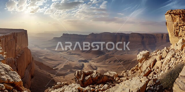 منظر الغيوم والسحب البيضاء في السماء فوق المحميات الطبيعية الصحراوية، سلسلة الجبال والتكوينات والتشكلات الصخرية في المناطق الصحراوية، الوديان والقمم الصخرية في البراري، معالم اثرية تاريخية قديمة، اماكن سياحية مشهورة في المملكة العربية السعودية