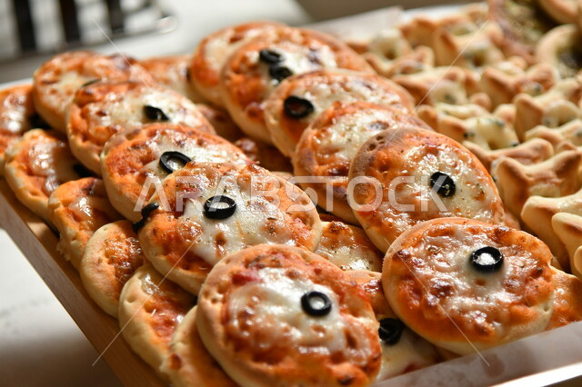 Cold summer drinks, sugars and high-calorie foods, a close-up photo of a plate of waffle bubbles dipped in chocolate sauce, a delicious coffee dessert, cafes and cafés in the Kingdom of Saudi Arabia