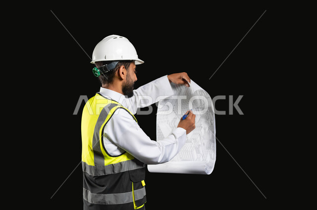Working in the engineering sector, the concept of project management and auditing, a portrait of a Saudi Arabian Gulf engineer wearing a traditional uniform with a protective jacket and helmet, following up on the work and project plans, full-length body image, black background, sensitive content, sensitive use