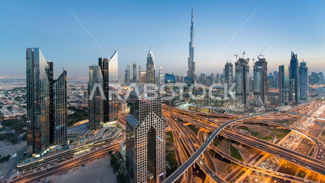 Network of paved roads and streets, architectural engineering art for commercial and residential facilities, aerial photo of towers and skyscrapers in the Emirate of Dubai in the United Arab Emirates, famous landmarks and tourist places.