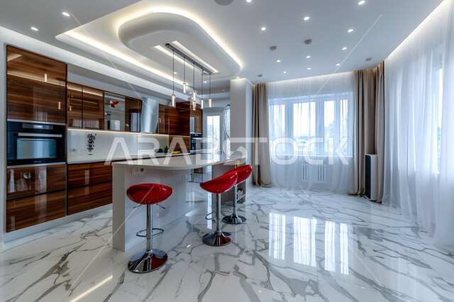 مطبخ بخزائن خشبية، فنون الهندسة المعمارية المتميزة الحديثة، ديكورات داخلية عصرية فاخرة، شقق وفلل سكنية في المملكة العربية السعودية، الطراز الفني الراقي في الأثاث المنزلي، طاولة وكراسي باللون الأحمر