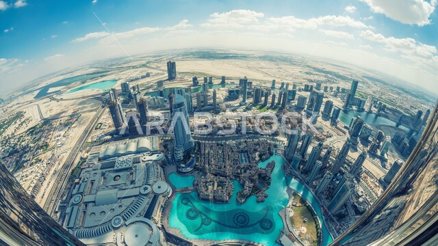 التقدم والتوسع العمراني في دولة الإمارات العربية المتحدة، الفن الهندسي المعماري للمباني والمنشآت السكنية والتجارية المطلة على البحر، صورة جوية للأبراج وناطحات السحاب في إمارة دبي السياحية، الواجهة البحرية على ساحل الخليج العربي