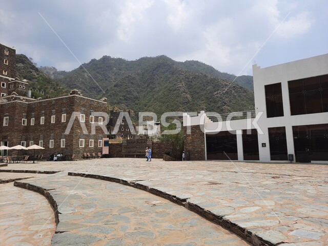 Architectural engineering art of old-style buildings in the city of Abha, famous landmarks and tourist places in the Kingdom of Saudi Arabia, the archaeological village of Rijal Almaa in the Asir region, stone buildings with wooden windows, attracting and attracting tourists from all over the world.