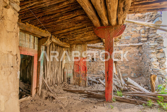 Wooden ceilings and columns, ancient architectural art, historical archaeological castles built of stones in the city of Al-Baha, stone houses and buildings in heritage villages, famous tourist attractions in the Kingdom of Saudi Arabia