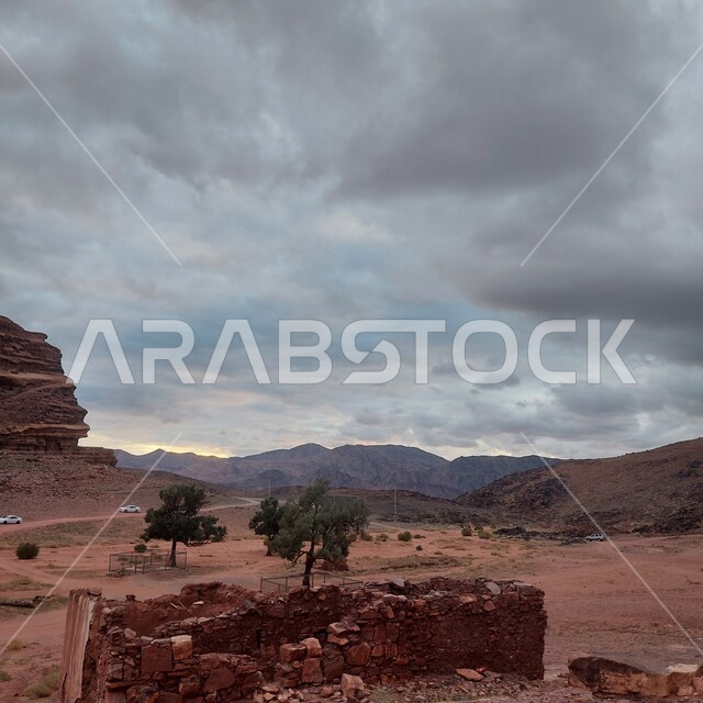 Archaeological historical monuments, natural rock formations and formations in the city of Al-Ula in the Kingdom of Saudi Arabia, foggy skies above the mountains, nature in desert areas, cities and tourist places.