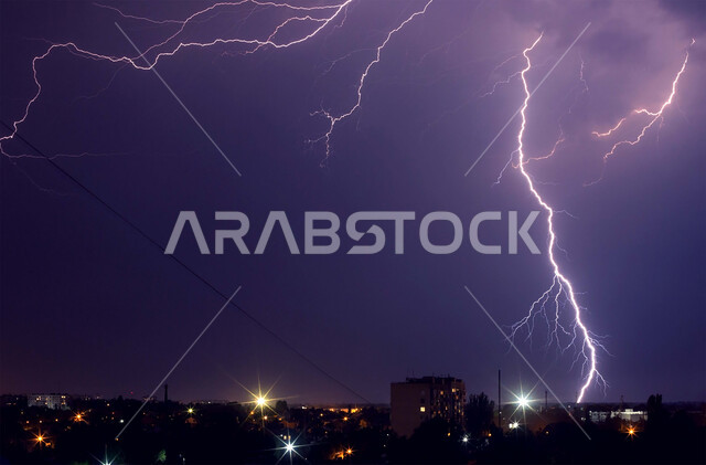 Winter weather in Dubai and Abu Dhabi, disasters and natural phenomena, a thunderstorm hitting the United Arab Emirates, a view of thunder and lightning in the sky