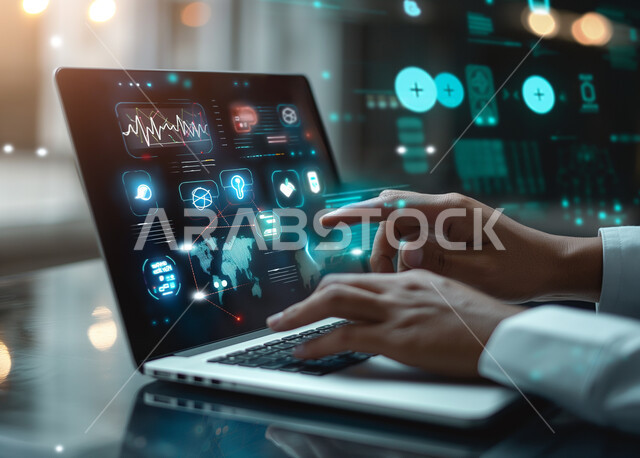  استخدام الأجهزة التقنية الحديثة في الأعمال المكتبية، خلفية هولوجرامية ثلاثية الابعاد لأيقونات الأبحاث العلمية، النمو التكنولوجي والتطور الرقمي في مجال الذكاء الإصطناعي، صورة مقربة ليدين رجل عربي خليجي سعودي يقوم بالنقر والتفاعل مع لوحة المفاتيح