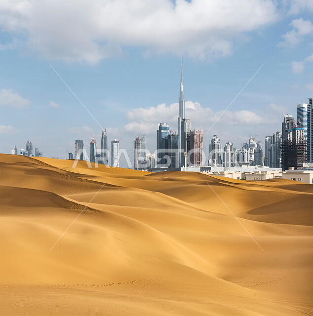 التطور المعماري في المباني وناطحات السحاب، البيئة الصحراوية والكثبان الرملية،  السماء المليئة بالغيوم القطنية، الهندسة الفنية المعمارية على الطراز الحديث والمتطور