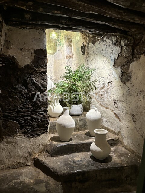 A store selling white pottery and pottery products, heritage pottery market, popular handicrafts, ancient archaeological buildings, crafts and handicrafts in the Kingdom of Saudi Arabia